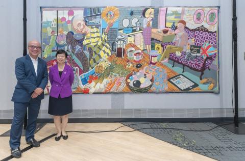 Dato’ Kho Hui Meng and SMU President Professor Lily Kong with the artwork, ‘The Annunciation of the Virgin Deal’