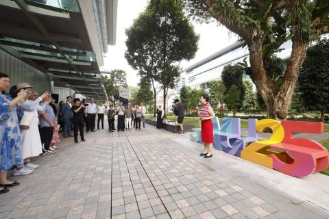 SMU's President Professor Lily Kong giving the opening remarks at the garden
